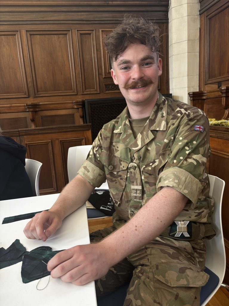Soldier sewing